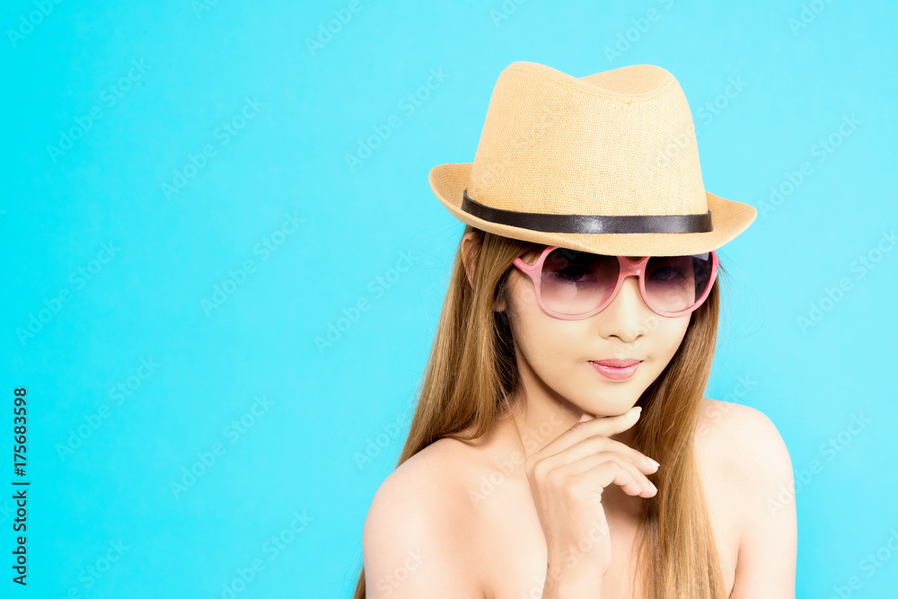 Young Asian woman thinking isolated on blue background. Young Asian woman thinking isolated on blue background.