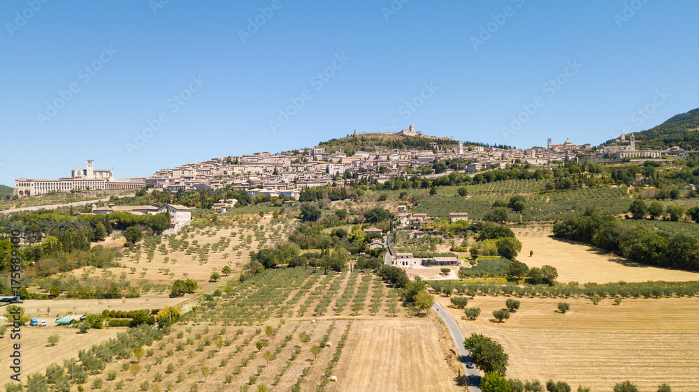 Assisi, one of the most beautiful small town in Italy. Aerial view of the skyline of the village from the land