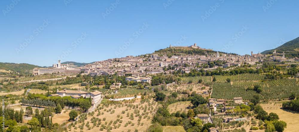 Assisi, one of the most beautiful small town in Italy. Aerial view of the skyline of the village from the land