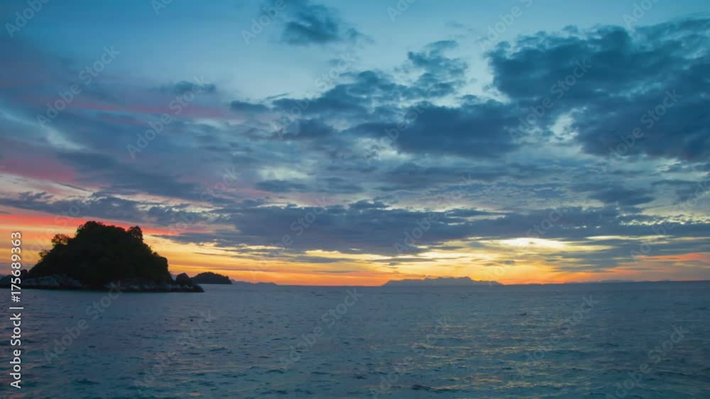 Sunrise over the sea. Timelapse. Beach on Koh Lipe island, Thailand Sunrise over the sea. Timelapse. Beach on Koh Lipe island, Thailand