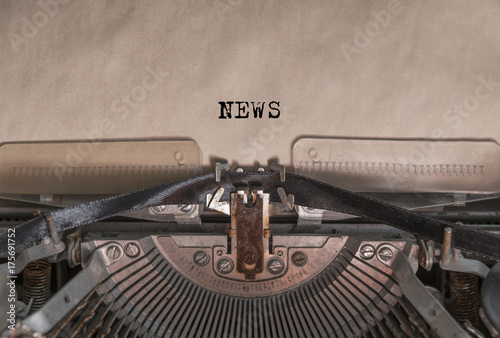 The words "News" written by an old vintage typewriter