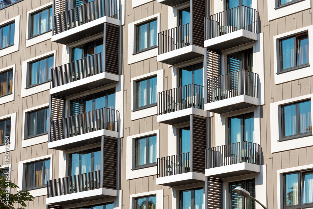 Detail of a modern apartment building with lots of balconies Detail of a modern apartment building with lots of balconies