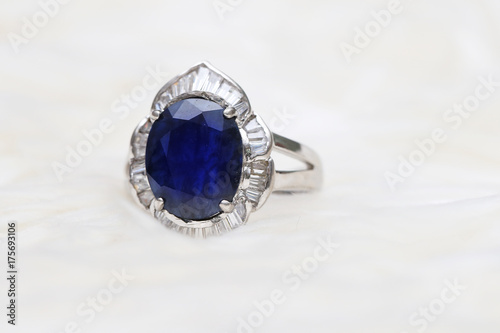 Blue gemstone on silver ring photo