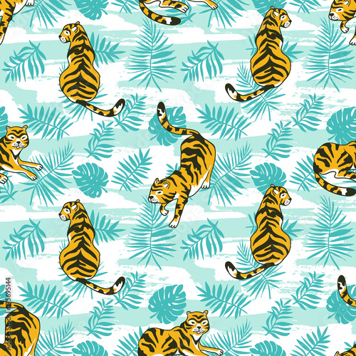 Tropical seamless pattern with tigers and palm leaves. Vector animalistic design for fabric, wrap paper or wallpaper. Exotic art background.