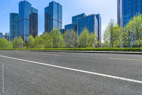 empty road and modern office buildings in shanghai