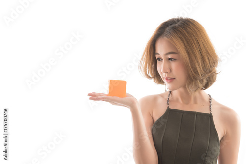 Beautiful young asian woman with aroma soap isolated on white background, healthcare concept.
