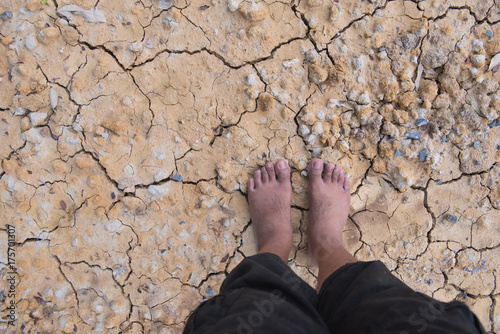 foot on dry soil.