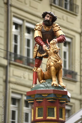 Statue of the Samson Fountain at Kramgasse street in Bern, Switzerland photo