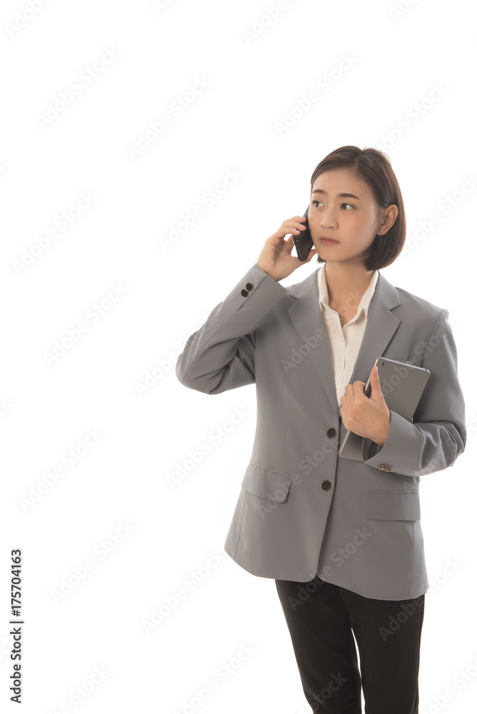 Portrait of Business asian woman with a cell phone and tablet isolated on white background. This image for working woman concept. Portrait of Business asian woman with a cell phone and tablet isolated on white background. This image for working woman concept.