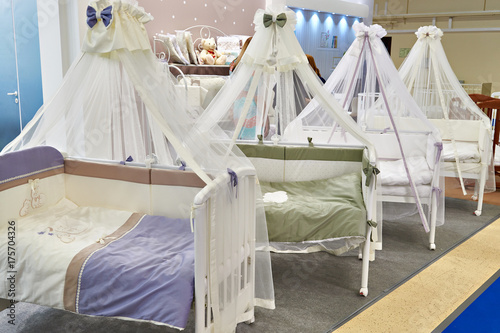 Fototapeta Naklejka Na Ścianę i Meble -  Baby beds with canopies