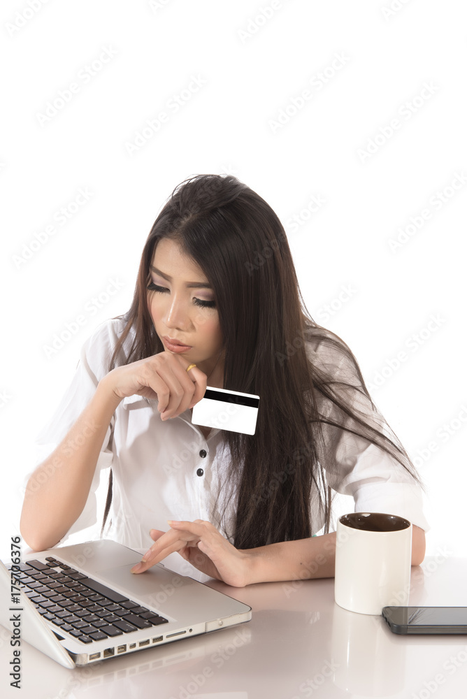 Portrait of woman using digital notebook for shopping online with credit card payment Portrait of woman using digital notebook for shopping online with credit card payment