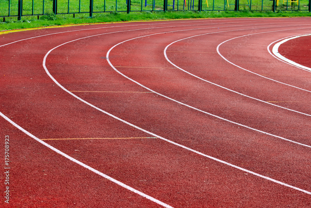 Fototapeta premium Track running, Red treadmill in sport field.