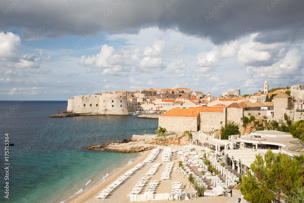 The famous sandy beach Banje with a magnificent view of the old town. Dubrovnik, Croatia
