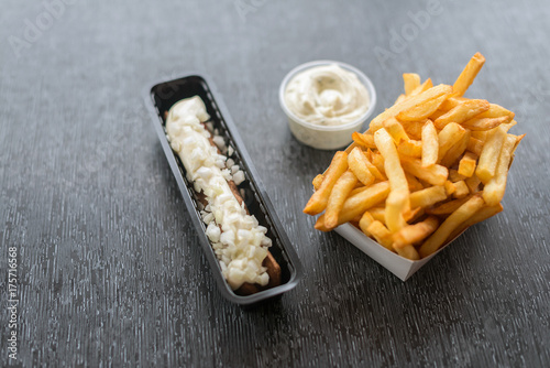 Frikandel with sauce and french fries photo