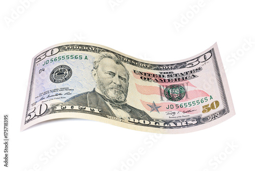 Twisted banknote of fifty US dollars photo