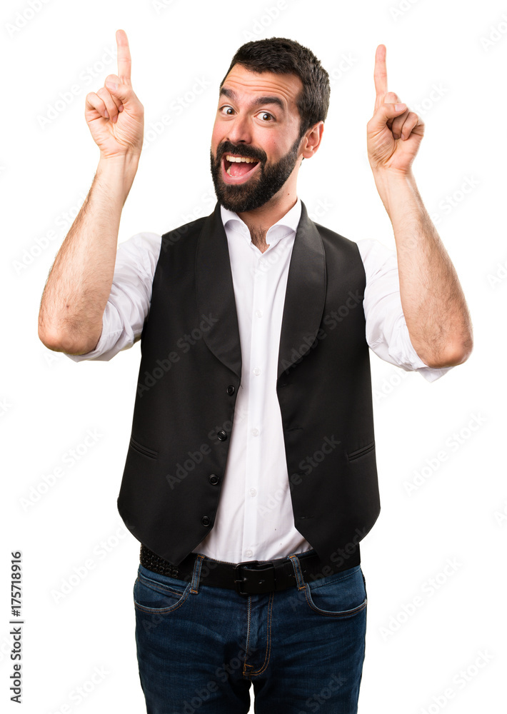 Cool man pointing up on isolated white background Cool man pointing up on isolated white background