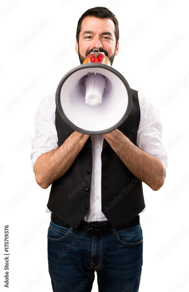 Cool man holding a megaphone on isolated white background Cool man holding a megaphone on isolated white background