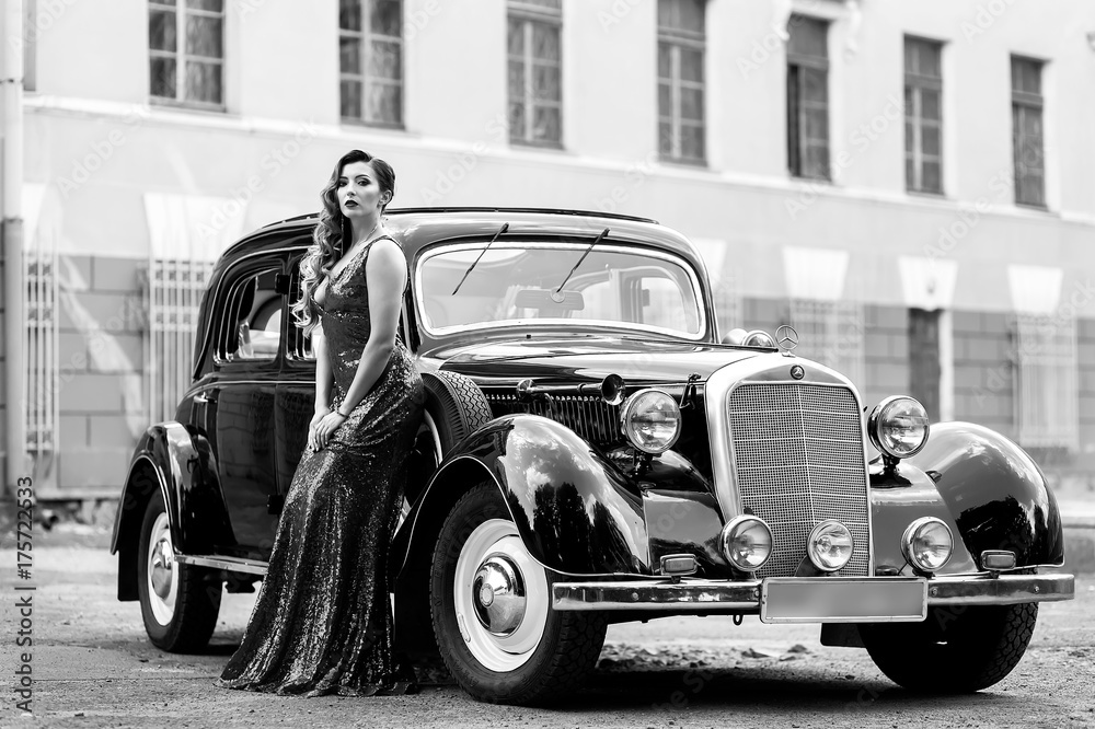 Gorgeous woman at retro car