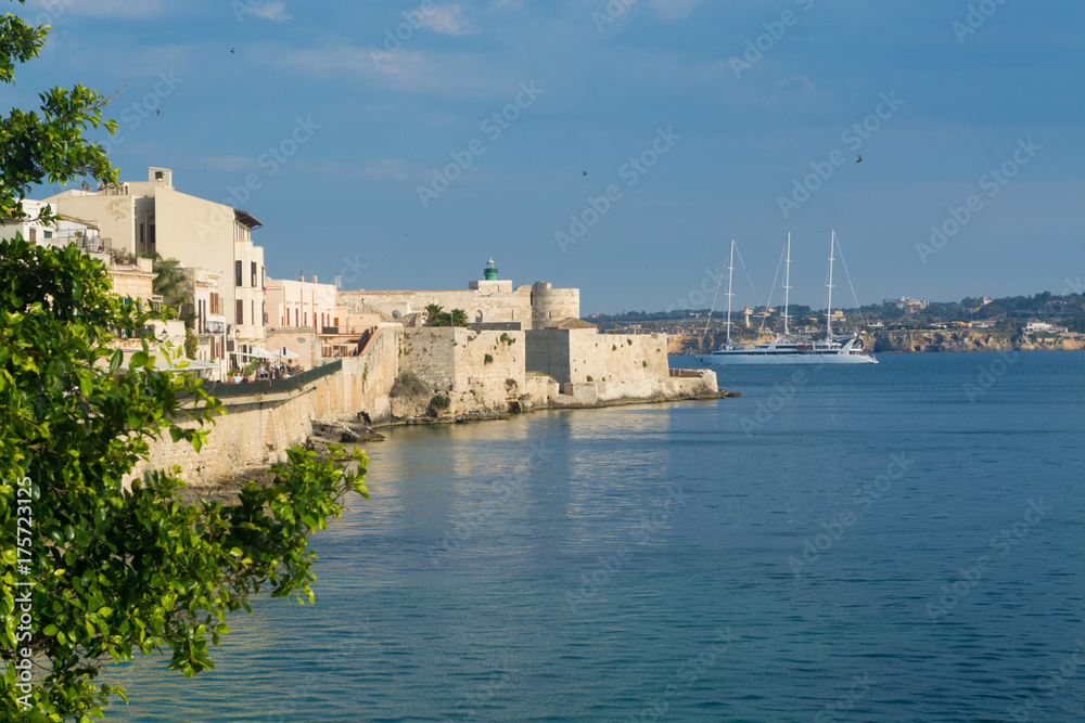 Coast of Ortigia island at city of Syracuse, Sicily, Italy. Beautiful travel photo of Sicily.