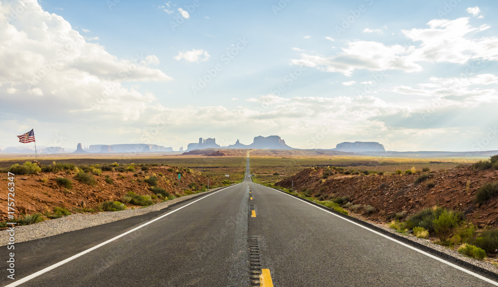 Forest Gump Point with Navajo American flag - Monument Valley scenic panorama on the road - Arizona, AZ, USA