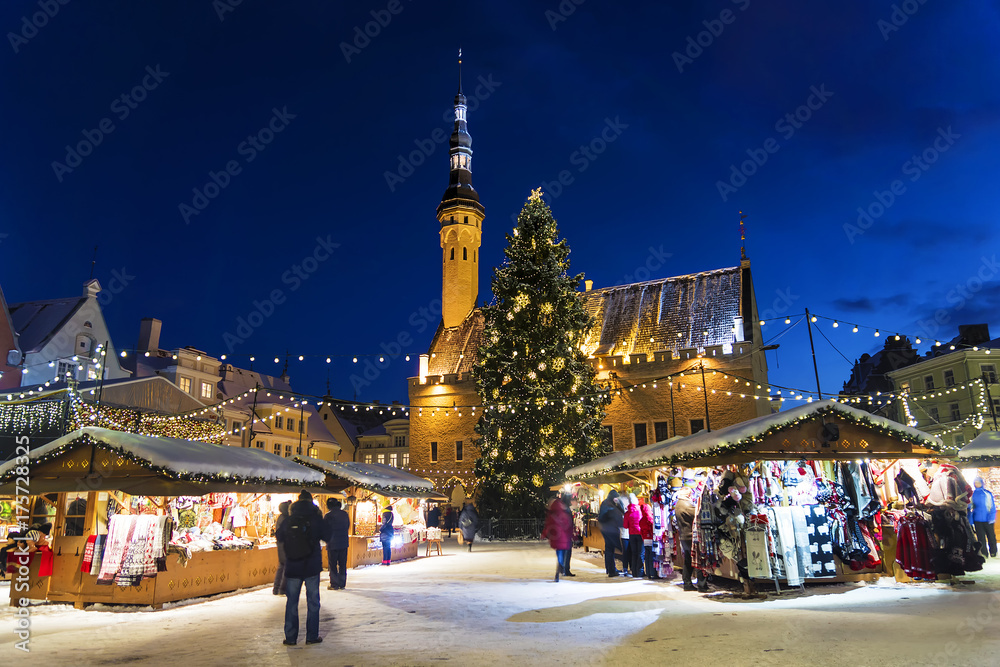 Fototapeta premium Christmas in Tallinn. Town Hall Square with Christmas Fair