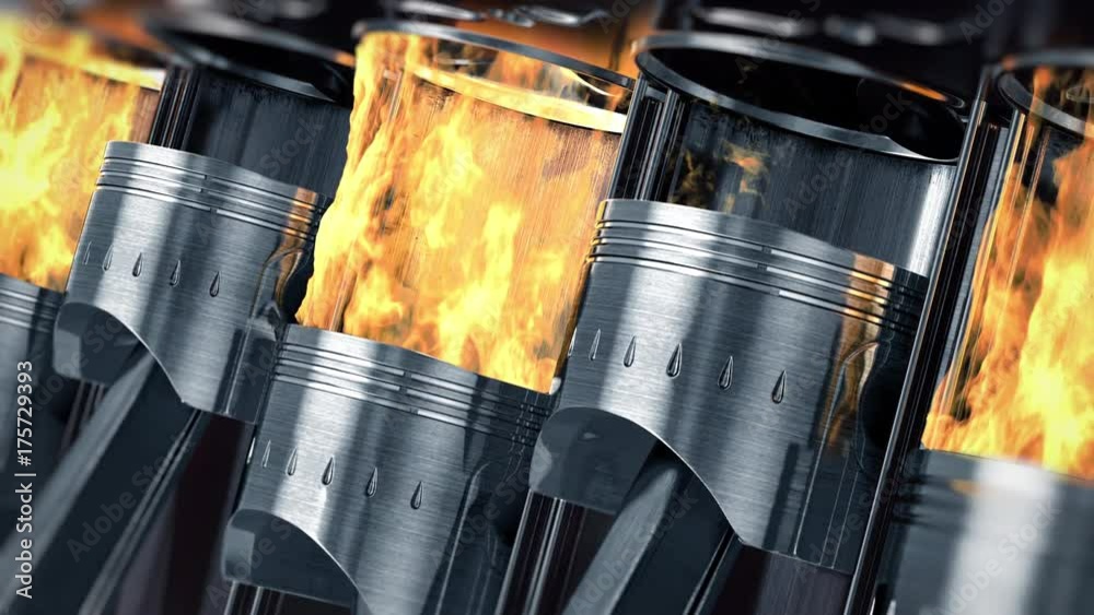 A close-up of engine in slow motion with explosions of fuel