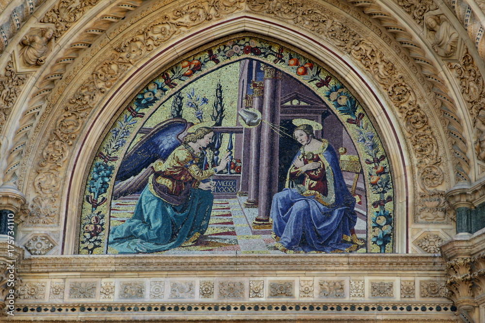 Tympan with coloured mosaic at the cathedral of Santa Maria del Fiore in Firenze