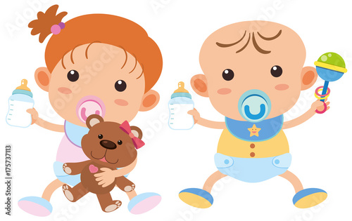 Baby boy and girl with milk bottles