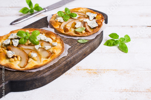 Traditional pizza with pear