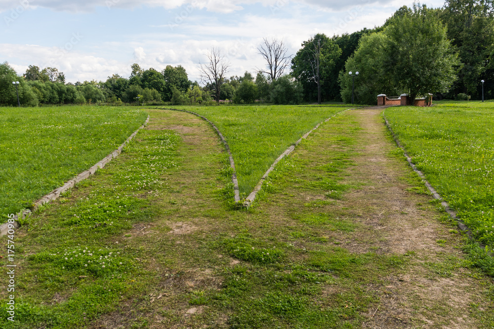 Crossroads of two roads in the old park. Crossroads of two roads in the old park.
