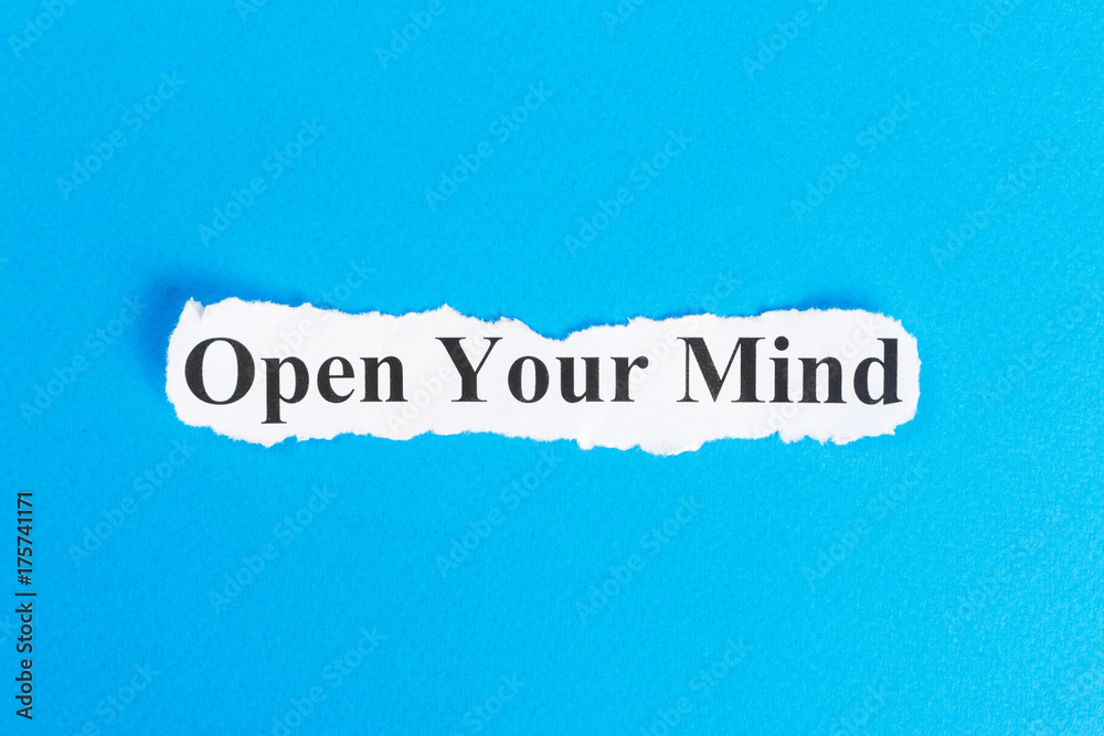 OPEN YOUR MIND text on paper. Word OPEN YOUR MIND on torn paper. Concept Image