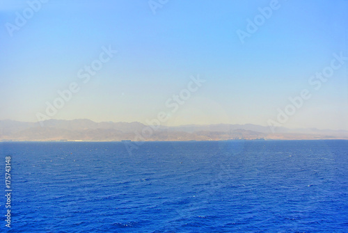 Red Sea. View of the Jordanian border. Eilat. Israel. The shore of the Gulf of Aqaba