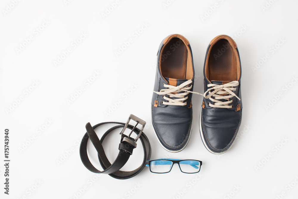 Set of men's shoes and accessories on white Set of men's shoes and accessories on white