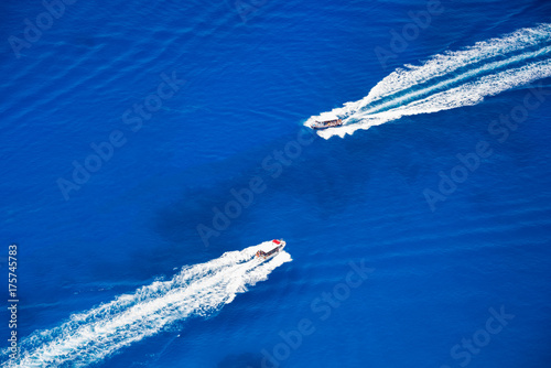 Two motor boats going on high speed in blue sea © Maresol