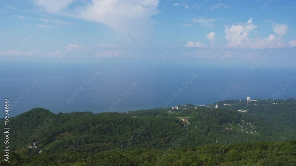 Panorama of resort city Sochi on the Black Sea among the Caucasus Mountains, aerial view 4k
Panorama of resort city Sochi on the Black Sea among the Caucasus Mountains, aerial view 4k