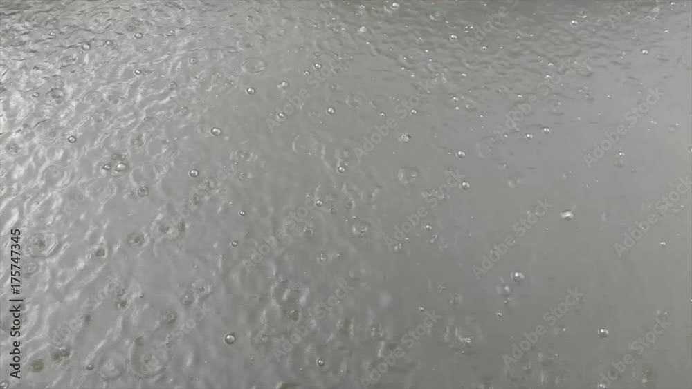 Rain drops on floor cement. Heavy rain drops. Rain drops on floor cement. Heavy rain drops.
