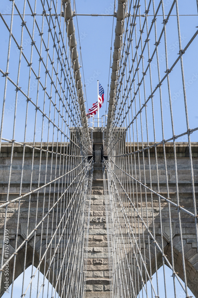 Fototapeta premium Brooklyn Bridge with USA flag