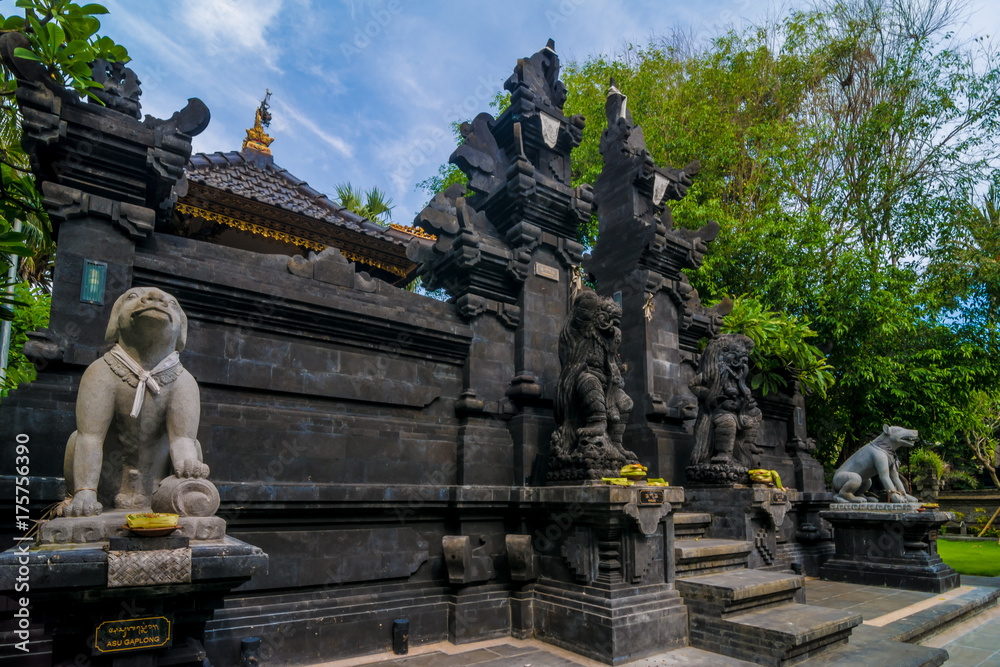 Statues at the entrance of a hinduist temple in Bali, Indonesia.