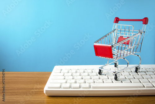 shopping cart with white keyboard in business digital market