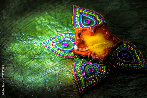 Rangoli design around Diwali lamp