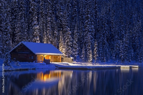 Night View of Lake Louise Canoe Rental Log Cabin in Winter. Banff National Park, Rocky Mountains Alberta Canada