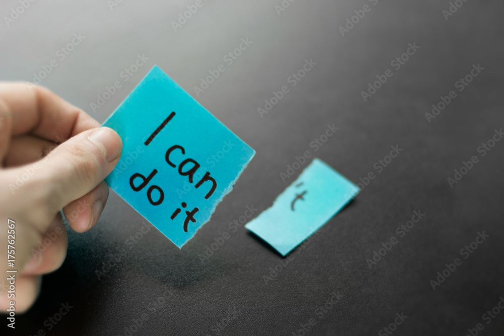 Hand holding motivational sticky paper. No excuses, i can do it. Hand holding motivational sticky paper. No excuses, i can do it.