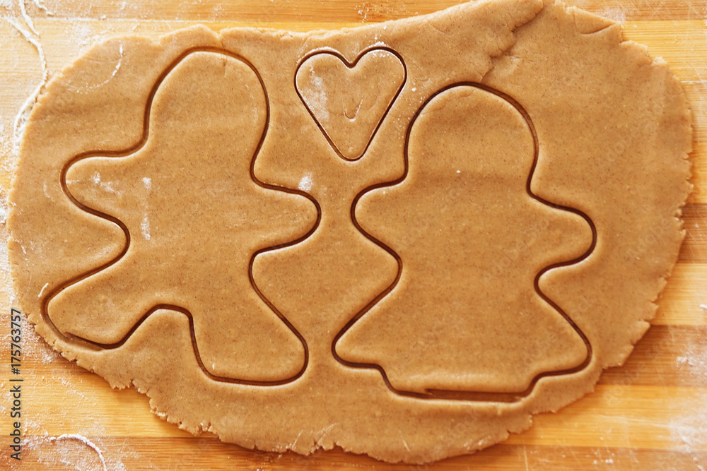 Homemade gingerbread cookies, forms and baking ingredients. Homemade gingerbread cookies, forms and baking ingredients.