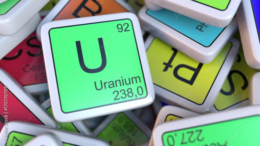 Uranium U block on the pile of periodic table of the chemical elements