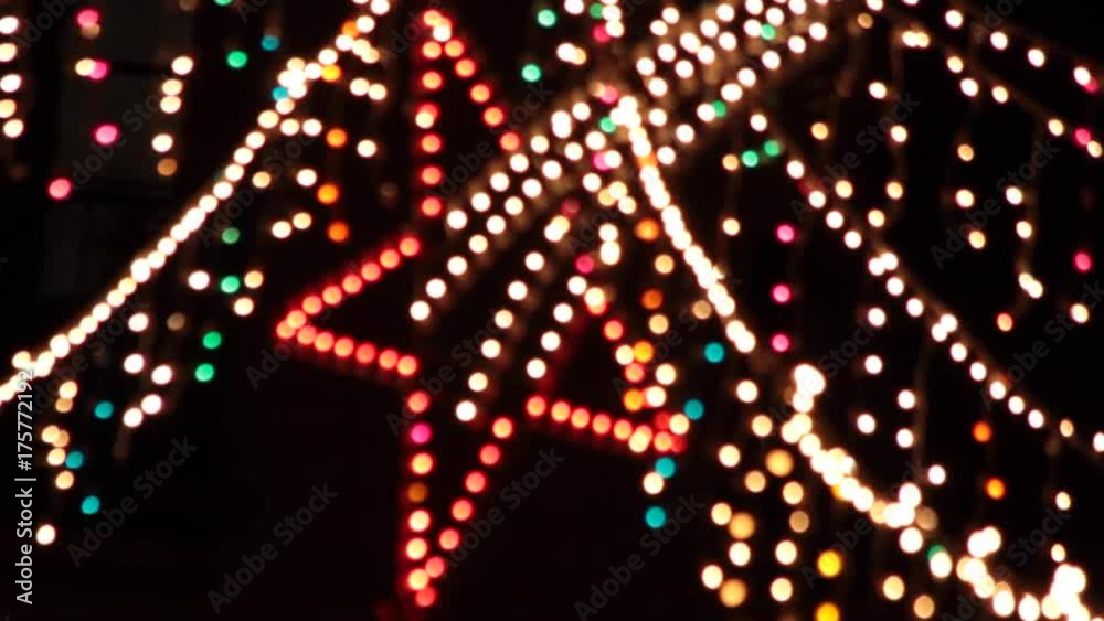 Luces de colores de Navidad con Estrella de Belen   borrosas y moviendose ligeramente