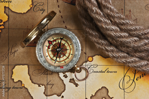 compass and rope on map