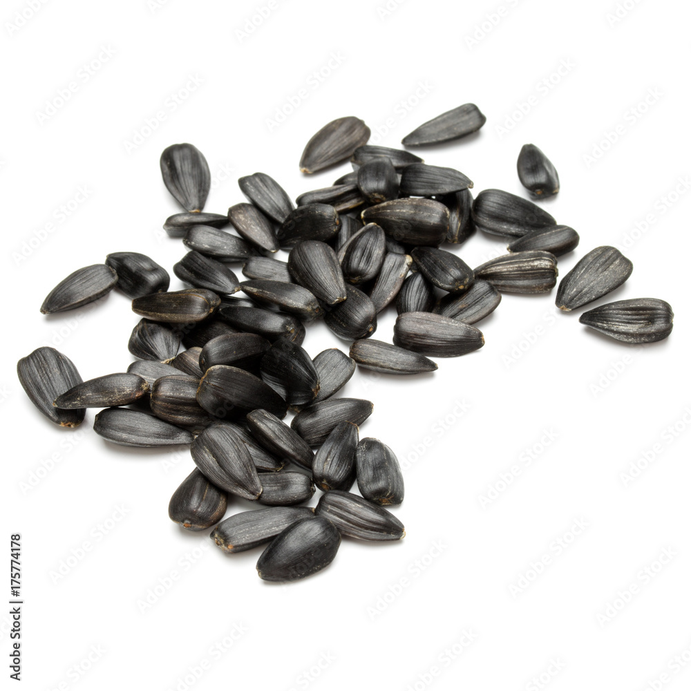 Sunflower seeds isolated on white background close up Sunflower seeds isolated on white background close up