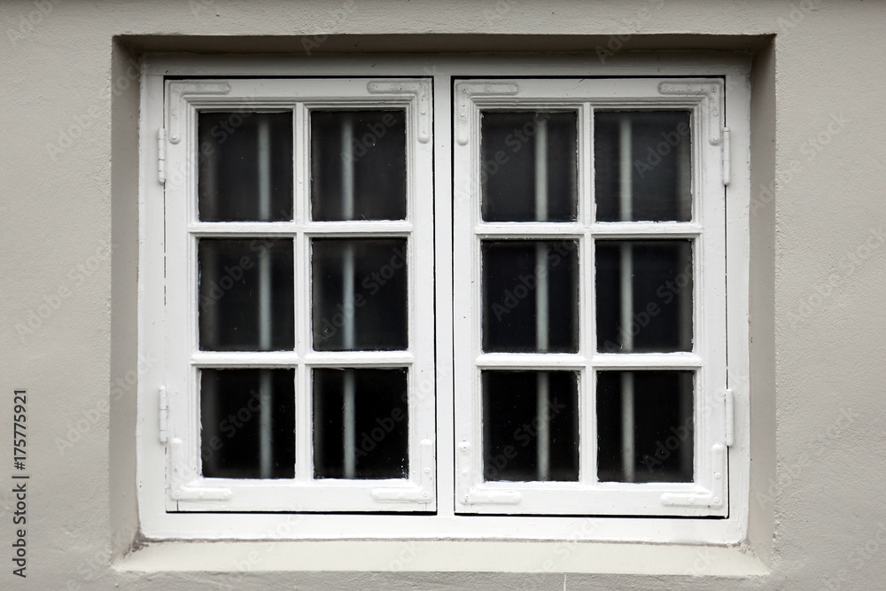 Window on a wooden white house