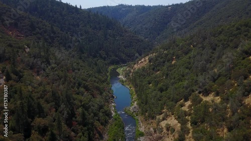 DRONE OVER LAKE CLEMENTINE DAM - Overview of mountain area with ascending drone