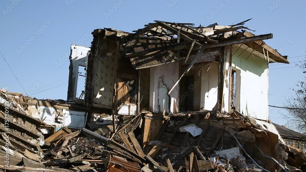 Consequences of the disaster. Ruined wooden houses Consequences of the disaster. Ruined wooden houses